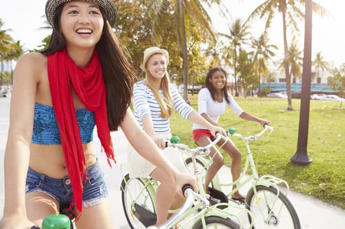 Girls having fun riding bikes