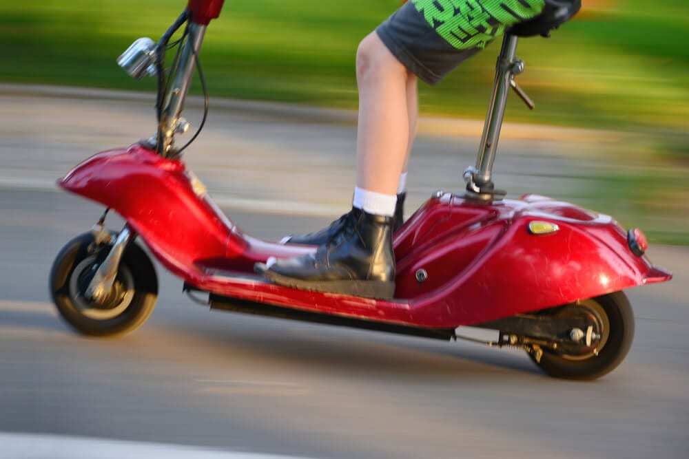 Kid on scooter