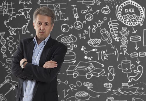 Guy next to blackboard